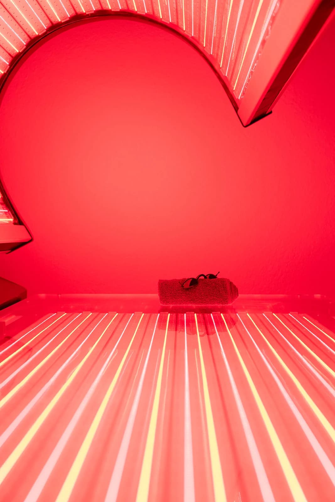 Inside the full-body red light therapy bed at OutRecover